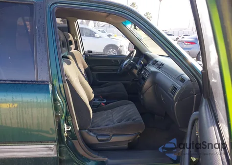 1999 Honda Cr-V Ex z USA, uszkodzony, nr VIN JHLRD1864XC045996